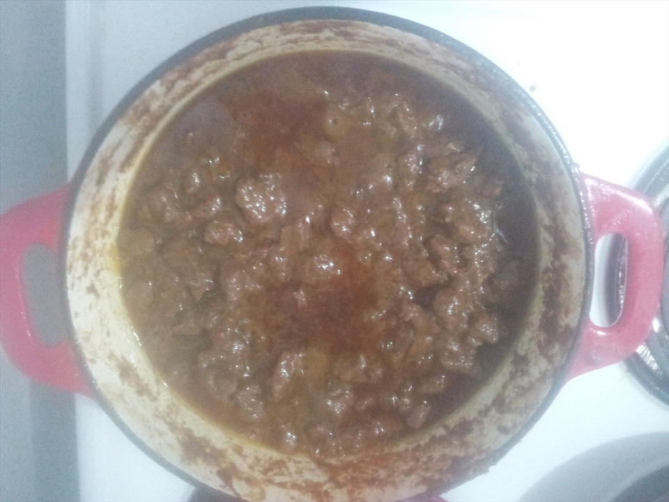 Beef Rendang approximately half done. Most of the coconut cream has evaporated off and spice paste is starting to concentrate and thicken. 