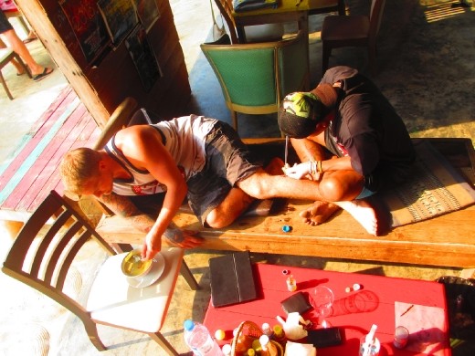 Sun's practising bamboo tattoo with Niklas