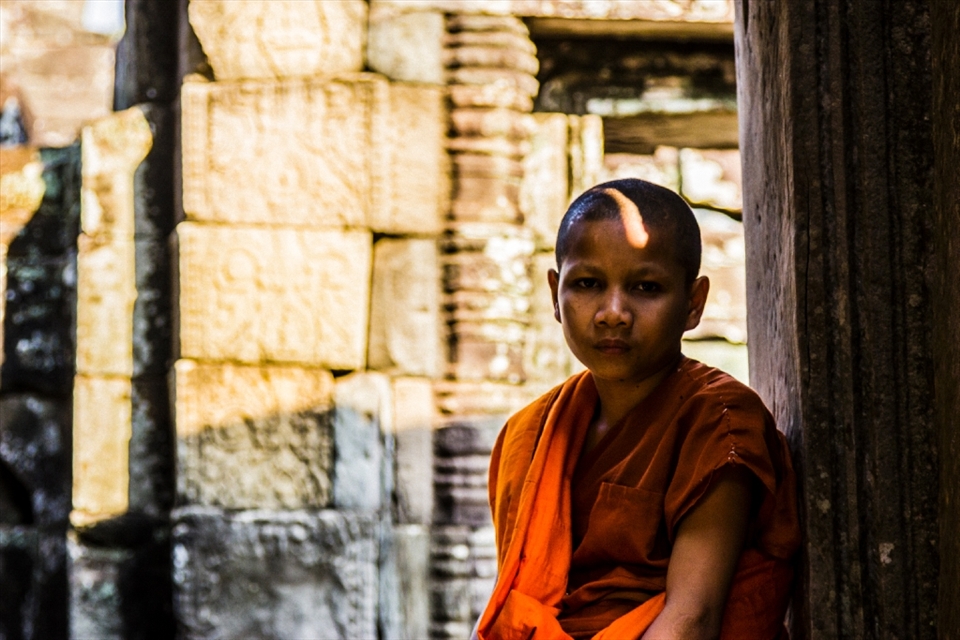 This child monk was an incredible character. He told me he lived in Siem Reap and came to the Angkor temples everyday. He seemed much too serious for his age but showed no sign of animosity to the fact. He spoke much better English than i spoke Khmer, so I was able to ask him to help me compose the photograph among the busy temple. He seemed to like the final result.