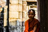This child monk was an incredible character. He told me he lived in Siem Reap and came to the Angkor temples everyday. He seemed much too serious for his age but showed no sign of animosity to the fact. He spoke much better English than i spoke Khmer, so I was able to ask him to help me compose the photograph among the busy temple. He seemed to like the final result.: by tim8836, Views[561]