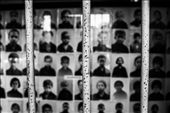 Tuol Sleng Genocide Museum, Phnom Penh. In the heart of the vibrant city stands the most stark reminder and memorial to Cambodia's brutal past. It is a symbol of the nations desire to never forget those who suffered under the Khmer Rouge regime. In this photograph I tried to capture the emotional impact of the thousands of pictures of those killed at the former high school. It stands to this day as the most intensely emotional place I have ever visited.: by tim8836, Views[357]