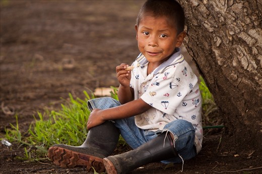 In the town's park, a young boy found a snack of a small piece of bread. The value that he showed for one small piece of bread demonstrates the extreme hunger and poverty that many children in Parramos face.
