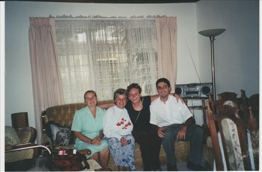 My host family and I.  The town claims my ma is a witch, they say she was praying and the roof blew off of her house.