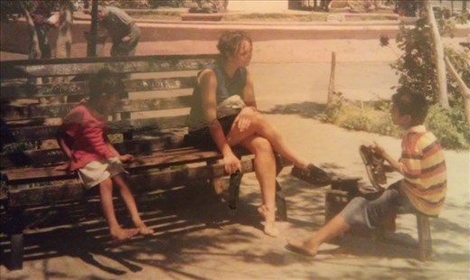 Me, not wanting to get my sandals shined by a child, and two fine young gentlemen who taught me to be a nicer person.