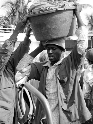 Title: Painful working day
======================
Life is very difficult and they have worked really hard trying to make a living so their child can have enough to eat. Parent's love are priceless 