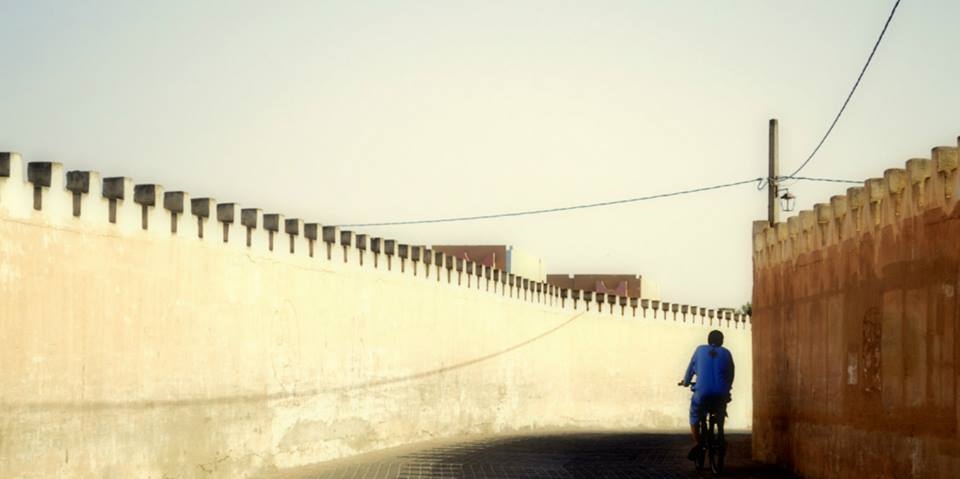 The cycler, one of the medina's roads 