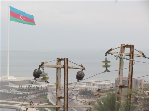Azerbaijan National Flagsquare from two electricity towers perspective. 
