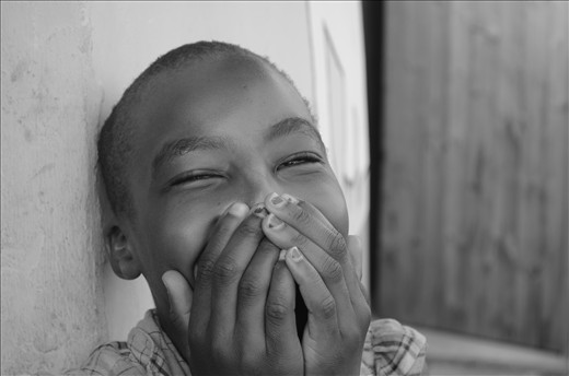 This is Isandla. She is one of the girls who stays with Mama Doris full time, as both her parents died from AIDS and she has no other relatives to take her in. We bonded after I bandaged her foot one day. It was covered in third degree burns, and when I asked what happened the only explanation I could get was simply 