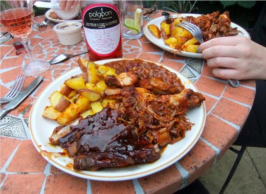 Served up with pulled pork, roasted potatoes and BBQ baked beans. 