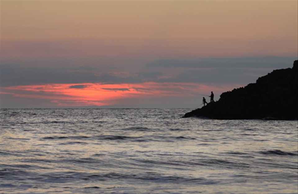 Father & Son fishing off the cliffs of Whitesands