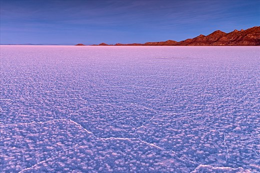 Sunrise over Salar de Uyuni , the world's largest salt flat with 10,582 square kilometers