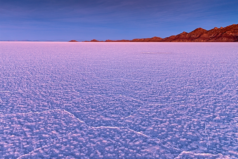 Sunrise over Salar de Uyuni , the world's largest salt flat with 10,582 square kilometers