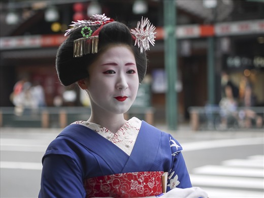 Geiko and maiko stand at the crossroads between past and present. Given the rigors of the profession and its adherence to customs that become increasingly outdated with each generation, the modern-day geisha is fast approaching extinction: at its peak, the sisterhood was 80,000 members strong; today in Kyoto, there are fewer than 300 working geisha, half of whom are located in Gion. It is unclear what the future may hold, but these geisha, already standing on the lip of time, may all too soon join the ranks of those no longer of this world and spoken of only as myth.