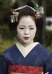 Draped in impossibly elaborate kimono—the most lavish of which can cost upwards of $100,000 USD—and with her face painted porcelain white, catching a glimpse of a maiko as she glides through the worn, well-traveled streets of Gion is akin to gazing upon not a flesh and blood woman, but a ghost. Poised and perfectly put together, geiko and maiko exude elegance and are the living embodiment of centuries of Japanese culture and tradition. So long as they continue to haunt its lanes and alleyways, Gion’s secret histories can endure.: by tonykuehn, Views[1091]