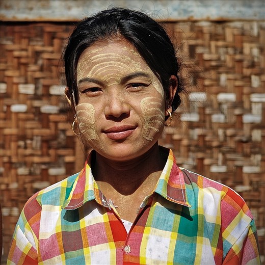 A friendly local using the traditional thanaka on her face