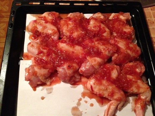 put chicken wings on oven pan