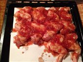 put chicken wings on oven pan: by toseetheworld, Views[408]