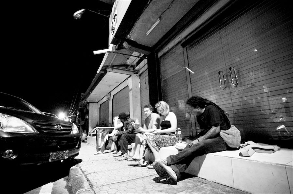 Me and friends devouring Nasi Kuning on the street in the early morning in Ubud
