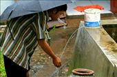 Imsak, 27 year old, a young villager from Semanu, Gunungkidul, took a “wudhu” or an Islamic ritual before praying. He used the water from a reservoir tub held rainwater during the wet season.: by tranquillity, Views[945]