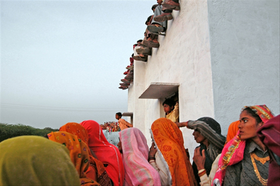 Search. A crowd gathers for a local fair.