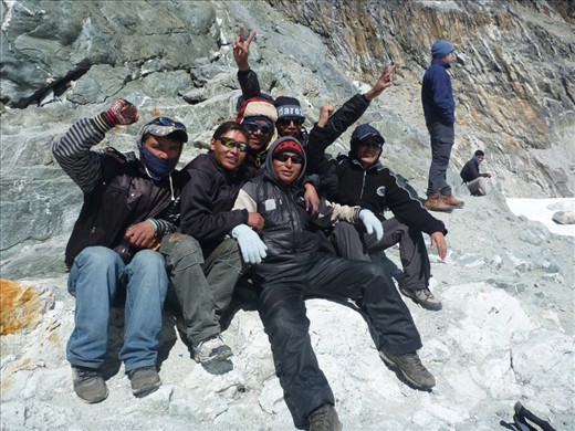 I was in Nepal to participate in a trek to Mount Everest Base Camp, however I found my most challenging day was crossing Cho La Pass.  If it was not for the Sherpas (their constantly smiling faces and positive outlook on everything) I would have struggled.  Here the Sherpas celebrate reaching the top of the pass.