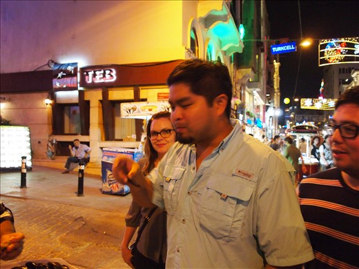 Eating stuffed street mussels