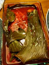 The dish coming out of the oven. Amazing color from the achiote paste.: by travellingmariposa, Views[385]