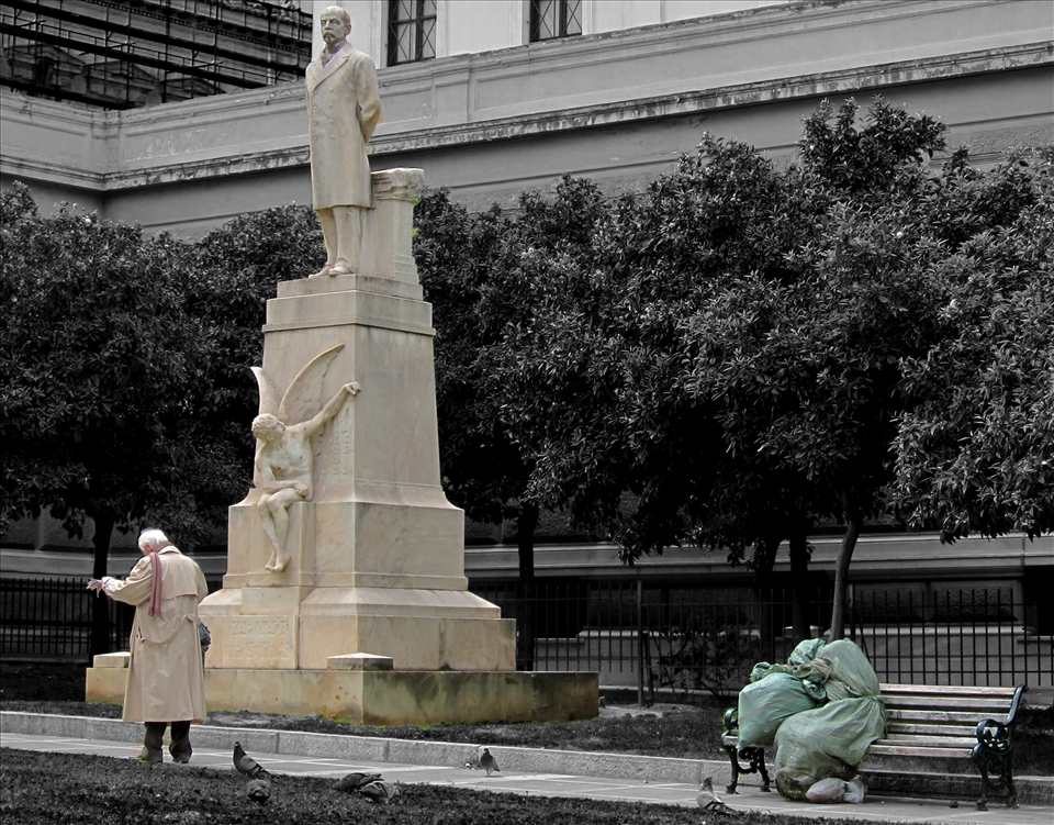 The dark side of the moon someone could say. A hopeless man on the right, sight was really a knife in my heart. Hundreds of people passing beside him but simply throwing a glance and passing away or not even just this, just reading their newspaper. Is our society that cruel anymore? Maybe ..... 