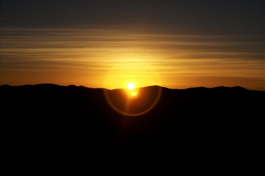 Sunset in the Atacama Desert (North of Chile). 
I took this photo in a bus during a 24 hours journey between the latitudes 18°24' S (Arica) and 29°55' S (La Serena). Serenity, grace and light hearted. 