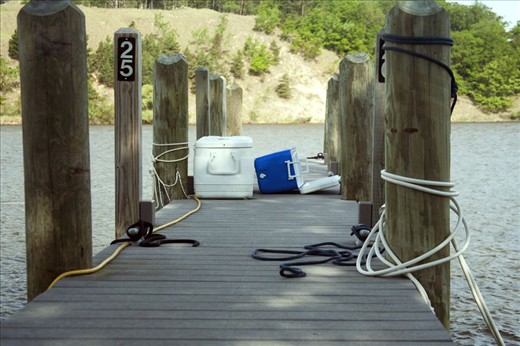 Empty dock that holds a cooler.