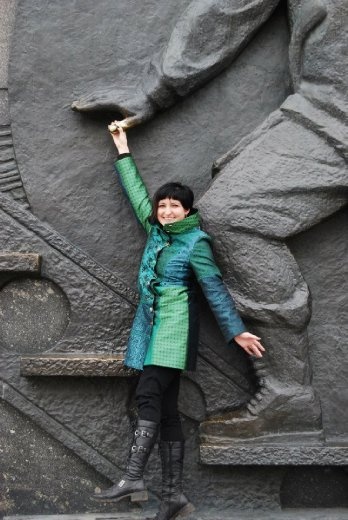 Me clinging to the side of the cosmonaut monument