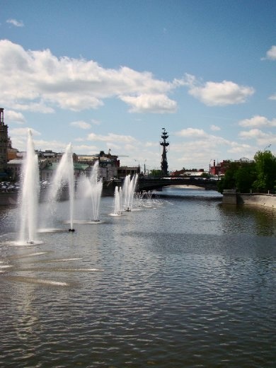 walking across this bridge and watching the water fountains in the river
