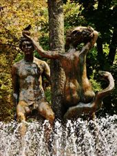 Adam with Eve holding out a bronze apple towards him: by treefrog, Views[153]