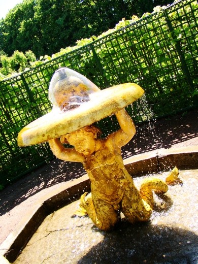 A golden cherub fountain
