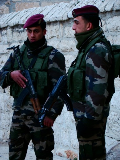 Armed guards in front of the church
