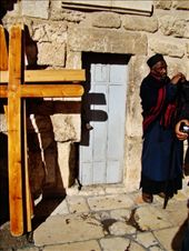 A priest standing in front of his small church: by treefrog, Views[271]