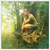 My friend Adrien taking a leisurely break on a pile of bricks (Bali, Indonesia): by triciflora, Views[238]