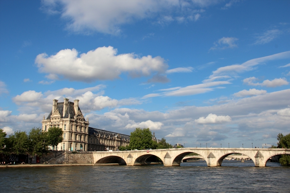 View of Louvru Museum from Seine river