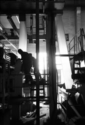 Workers undertake maintenance on an older paper machine at a mill in Fuyang, China: by tristanc, Views[246]