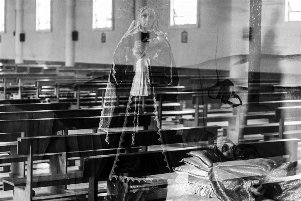 The empty seats of the local Catholic church in San Andrés Itzapa on the day of Maximon's birthday, October 28, a day of celebration. The church views Maximon, 