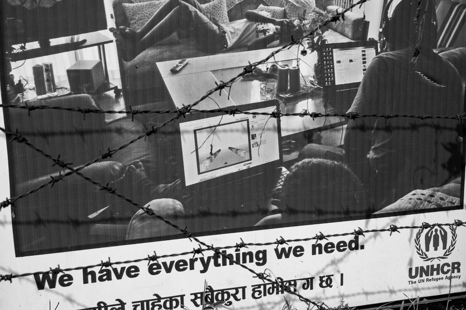 An advertisement in the Beldangi refugee camp in Damak in Eastern Nepal. After fleeing Bhutan in the 1980’s, around 30,000 people of the Lhotsampa ethnic group still live here, with most hoping to migrate to Western countries as they are not allowed to work in Nepal, nor return to Bhutan.
