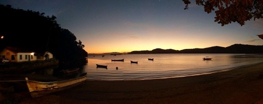Amanecer en Paraty (Sunrise in Paraty). Some friends and I were traveling around Brazil, saw all the tourist attractions, and then took a detour to Paraty (Rio de Janeiro). After driving pretty much the whole day, my friend pulled over the car to see this amazing sunrise that of course had to be captured.