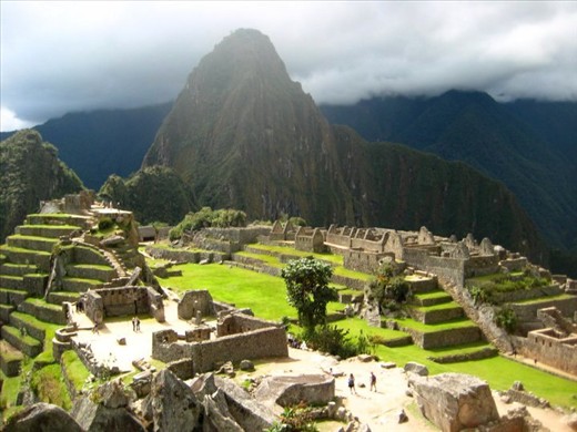 Magnificent ancient Inca city of Machu Picchu. After coming down  from Huayna Picchu (the big mountain) I stopped and admired the place. The clouds were clearing out allowing the sunrays come through and shine with all its spleandour over the city. It was magical!
