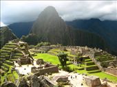Magnificent ancient Inca city of Machu Picchu. After coming down  from Huayna Picchu (the big mountain) I stopped and admired the place. The clouds were clearing out allowing the sunrays come through and shine with all its spleandour over the city. It was magical!: by trotamundos_2202, Views[848]