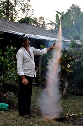 Native of the country celebrating the birthday of his boss with  illegal fireworks