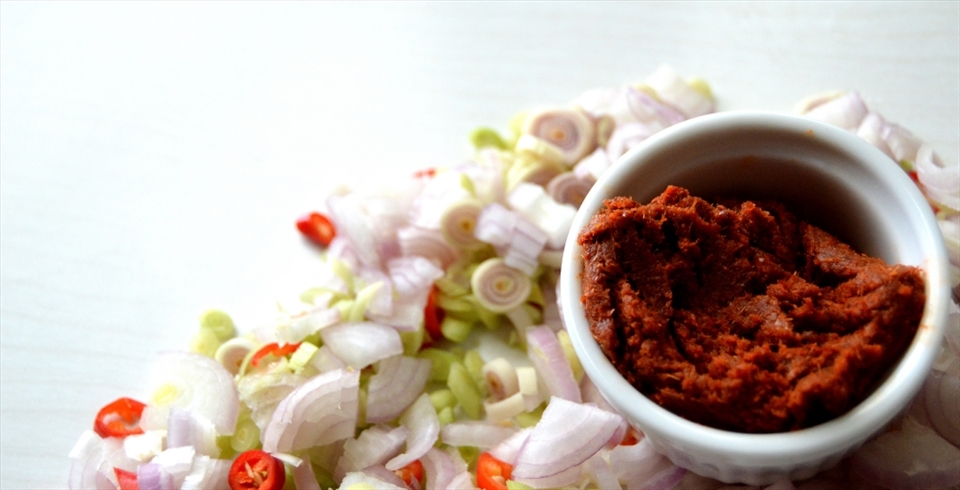 Diced onions, galangal and chilies which were blended into a paste