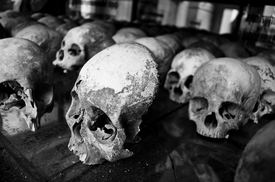 -The Innocent-
This image was taken at the Choeung Ek Killing Field site. An orchard and Chinese graveyard before the Khmer Rouge regime in the `70s turned it into a killing field, it houses a Buddhist stupa which displays more than 5,000 human skulls that have been unearthed. An estimated 17,000 people were brutally executed at the Choeung Ek killing field site alone, including women, children and even babies. As you walk through the fields you can still see human bones coming up through the dirt.