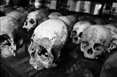 -The Innocent-
This image was taken at the Choeung Ek Killing Field site. An orchard and Chinese graveyard before the Khmer Rouge regime in the `70s turned it into a killing field, it houses a Buddhist stupa which displays more than 5,000 human skulls that have been unearthed. An estimated 17,000 people were brutally executed at the Choeung Ek killing field site alone, including women, children and even babies. As you walk through the fields you can still see human bones coming up through the dirt.: by tyson, Views[1023]