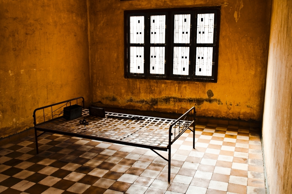 -Left Behind-
This image was taken at the sobering Tuol Sleng Genocide Museum in Phnom Penh. A high school before the Khmer Rouge Regime in the `70s turned it into the notorious Security Prison 21 (S-21), it saw an estimated 17,000 people were tortured and imprisoned in just four short years. Of that 17,000 only seven people survived. This cell, constructed in an old classroom, held officers of the Khmer Rouge after their own leaders turned on them. Beds (and sometimes bloodstains) are pretty much kept how they were found when the UN came to Cambodia and intervened.