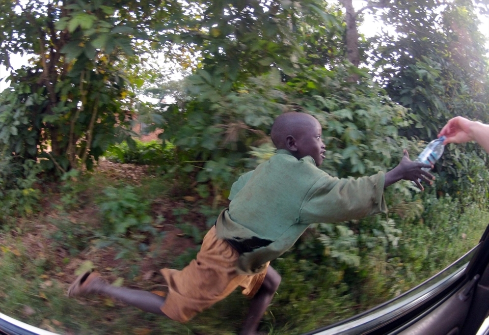 Uganda spawns one of the world’s largest fresh water sources yet
the struggle for clean water remains one of the daily tasks of upmost importance.  Every day children skip school to line the roads and scream for empty bottles to build up their family stores of the liquid necessity.
